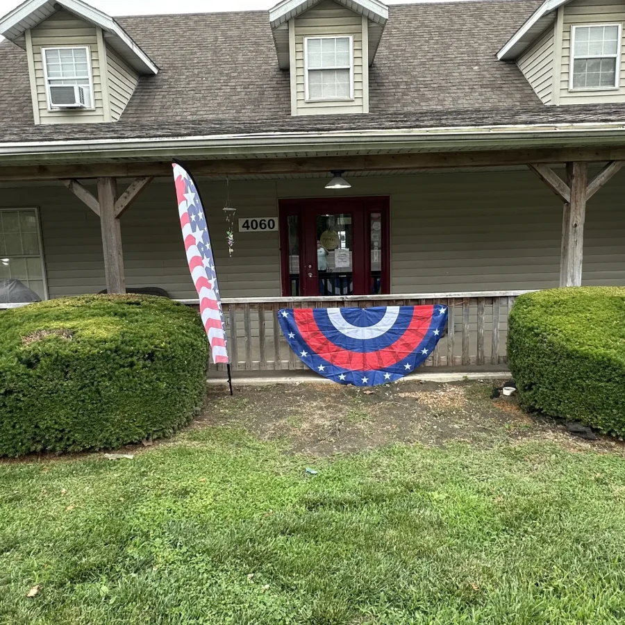 Cahokia RV Parque office entrance showing the address 4060 and front porch seating